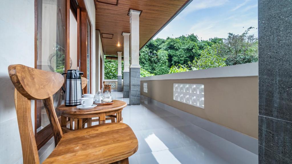 Balkón nebo terasa v ubytování Depi House Ubud