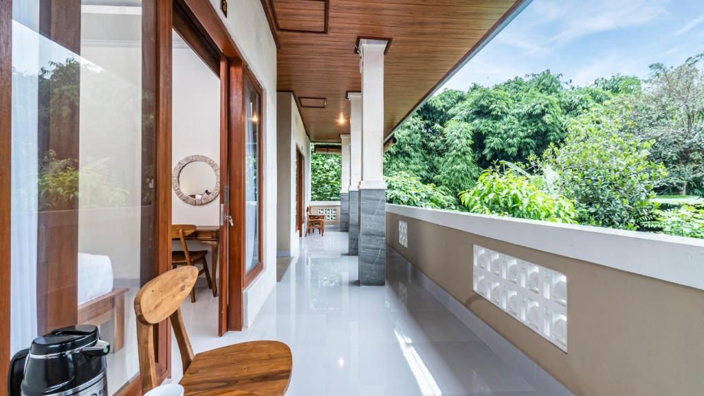 Balkón nebo terasa v ubytování Depi House Ubud