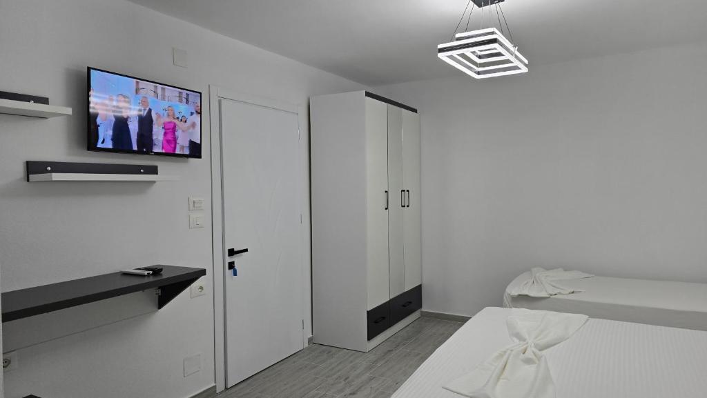 Postel nebo postele na pokoji v ubytování Guest House Pogradeci