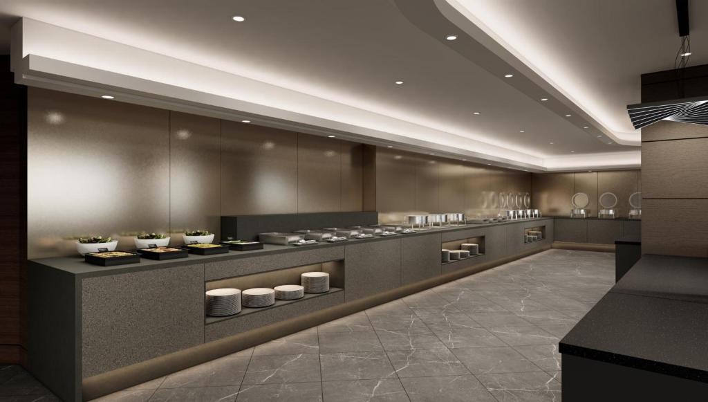 Kuchyň nebo kuchyňský kout v ubytování Kolon Hotel