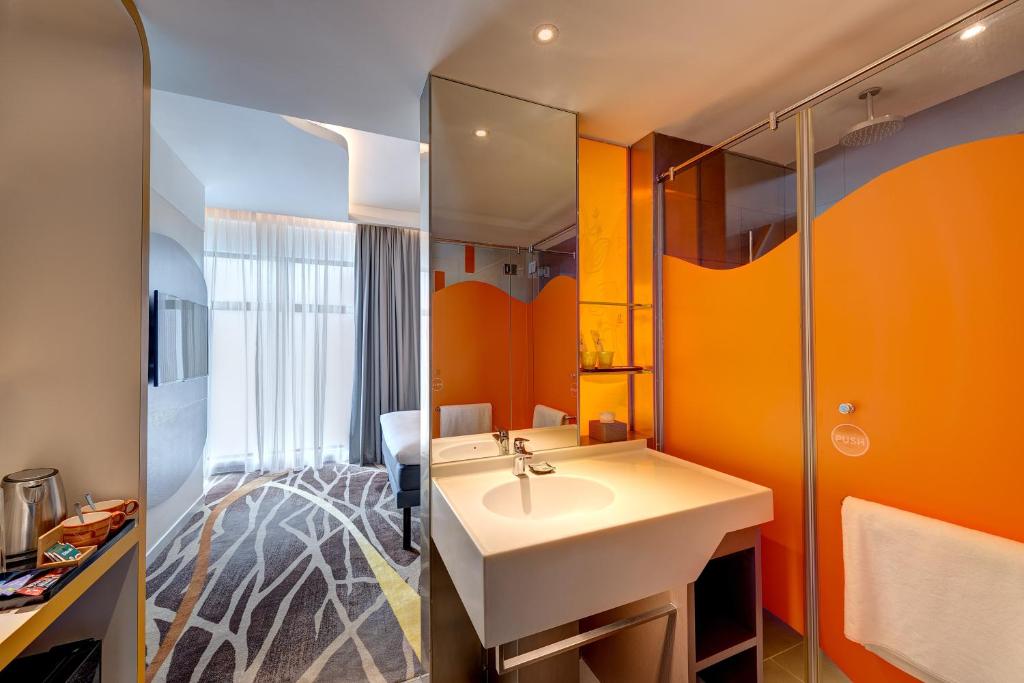 Postel nebo postele na pokoji v ubytování ibis Styles Johor Iskandar Puteri