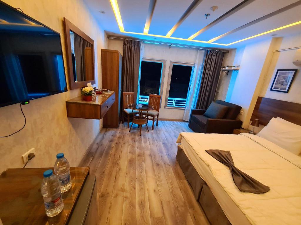 TV a/nebo společenská místnost v ubytování tourist hotel