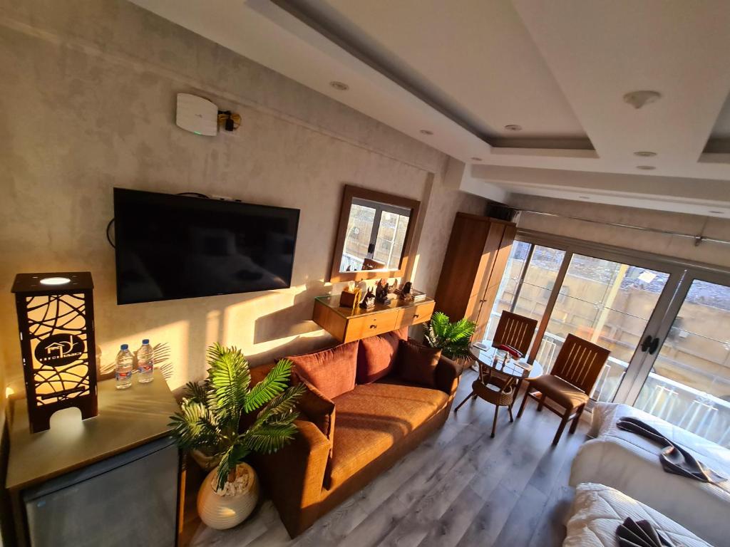 TV a/nebo společenská místnost v ubytování tourist hotel