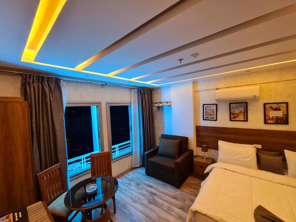 Postel nebo postele na pokoji v ubytování tourist hotel