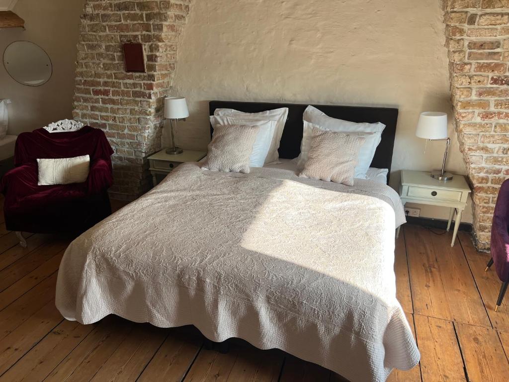 Llit o llits en una habitació de B&B In Bruges