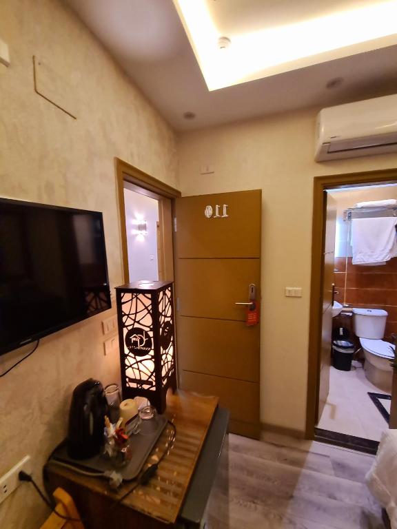 TV a/nebo společenská místnost v ubytování tourist hotel