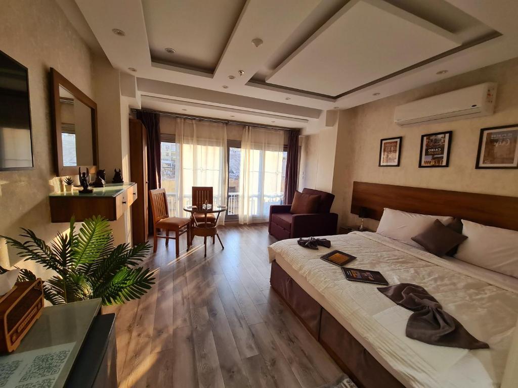 Postel nebo postele na pokoji v ubytování tourist hotel