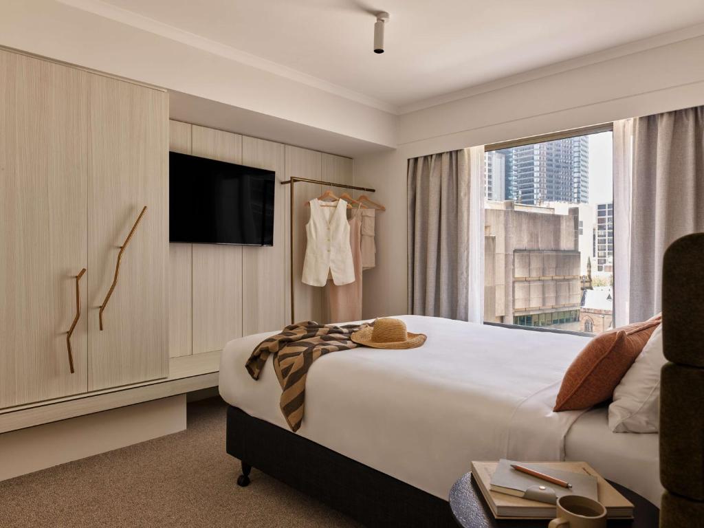 Postel nebo postele na pokoji v ubytování Adina Apartment Hotel Sydney Town Hall