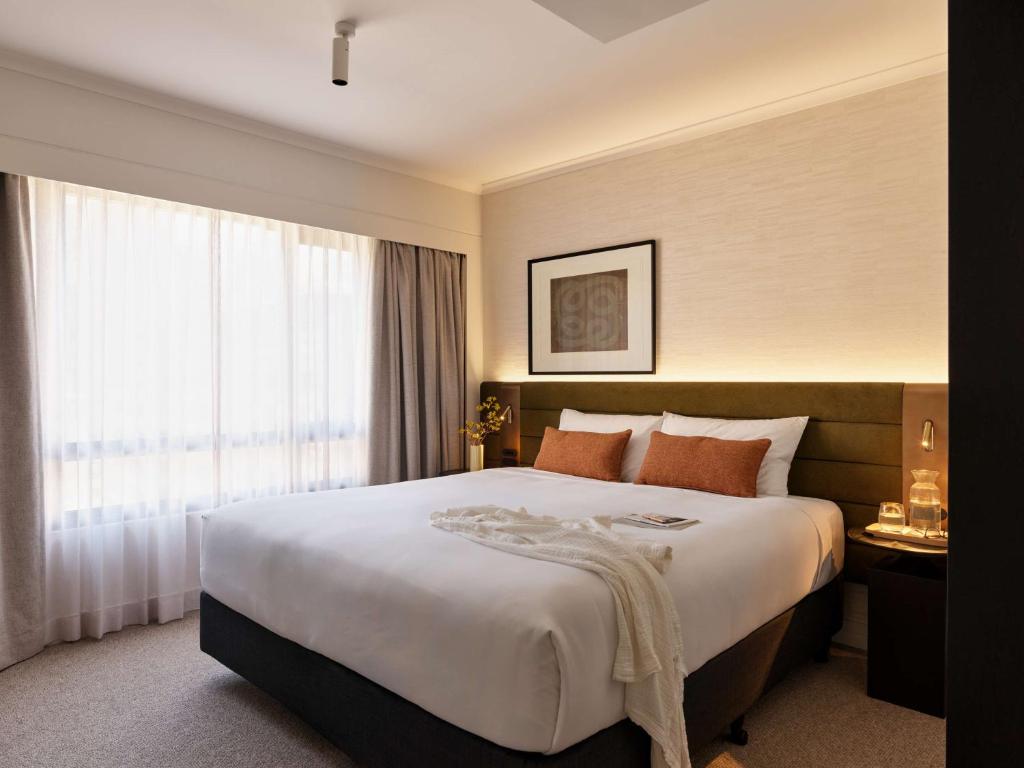 Postel nebo postele na pokoji v ubytování Adina Apartment Hotel Sydney Town Hall