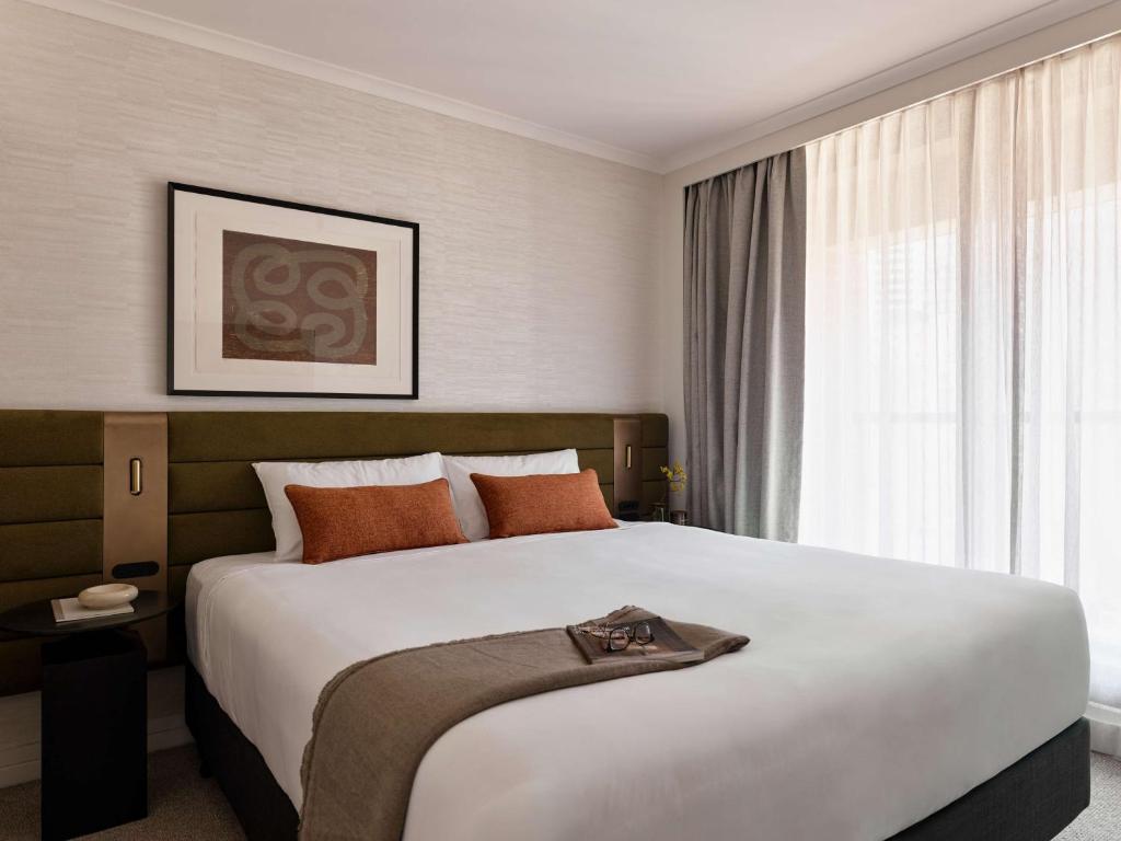 Postel nebo postele na pokoji v ubytování Adina Apartment Hotel Sydney Town Hall