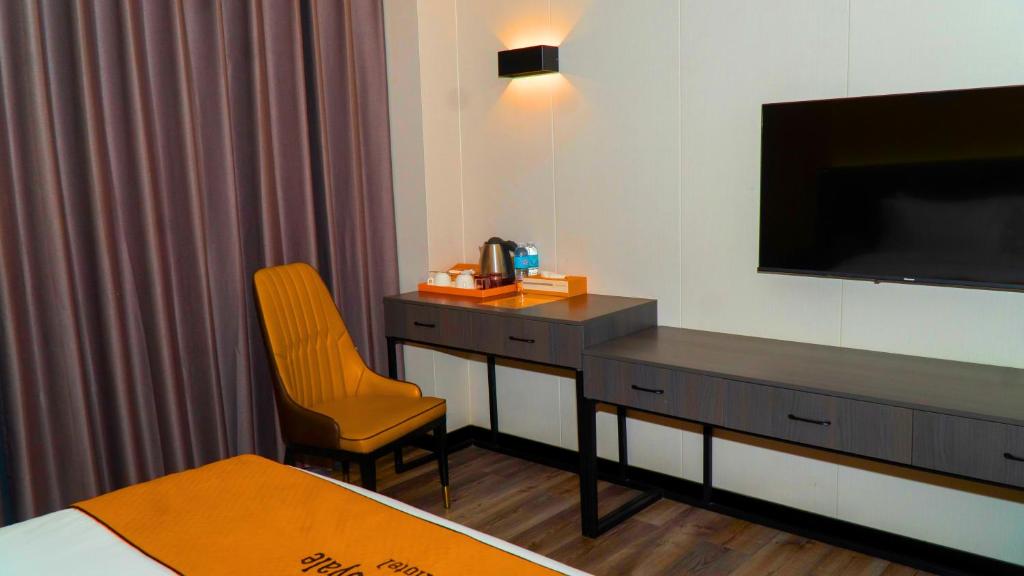 TV a/nebo společenská místnost v ubytování Venus Royale Hotel