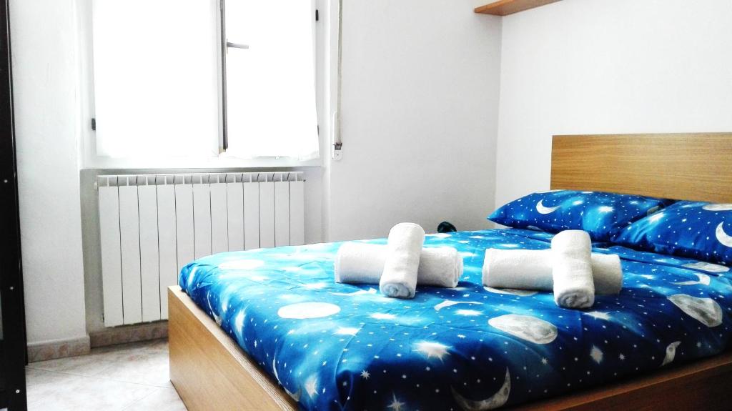 Posteľ alebo postele v izbe v ubytovaní Rogoredo Apartments