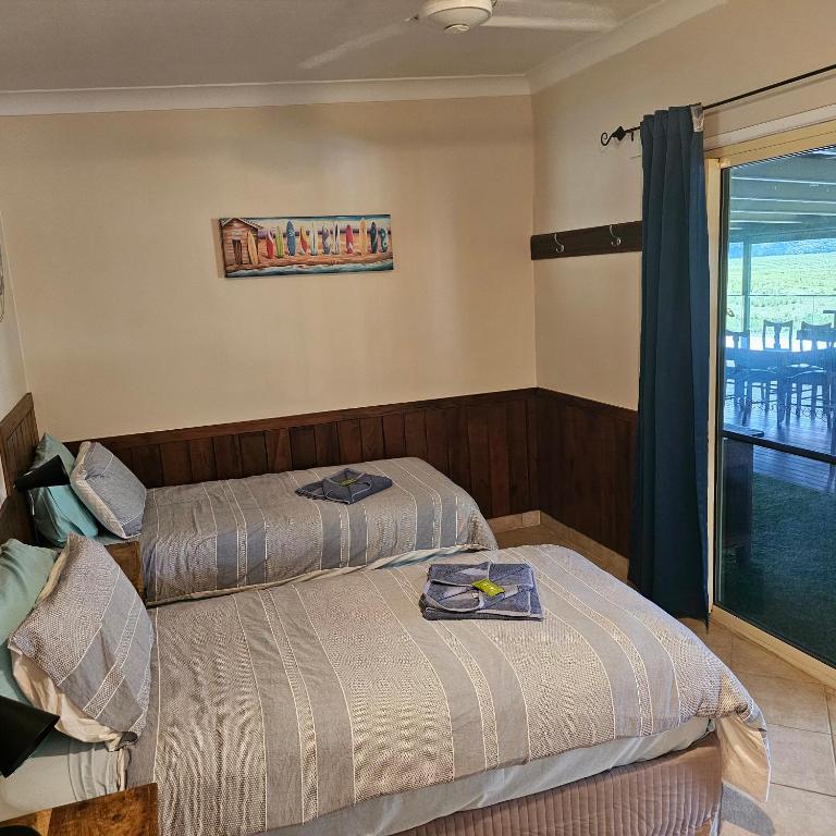 Postel nebo postele na pokoji v ubytování Daintree Riverview Lodges