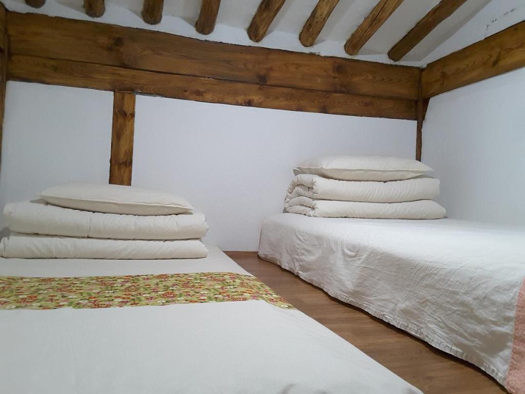 Postel nebo postele na pokoji v ubytování Yettle Hanok Stay