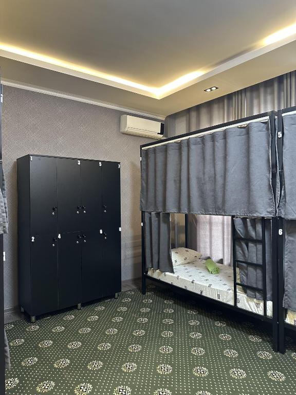 Postel nebo postele na pokoji v ubytování Ultra Hostel