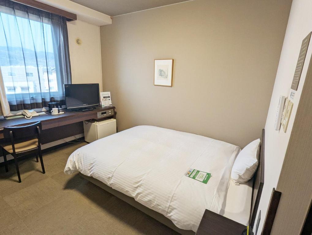 TV a/nebo společenská místnost v ubytování Hotel Route-Inn Court Shinonoi