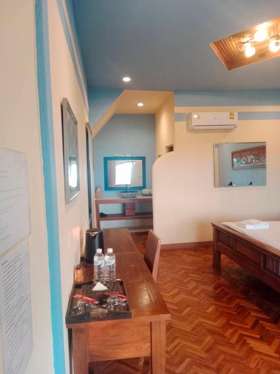 Postel nebo postele na pokoji v ubytování Pai villa by eoutfitting
