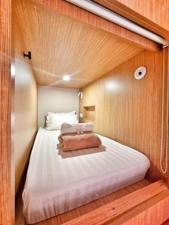 Postel nebo postele na pokoji v ubytování Moonstar Cebu Hotel