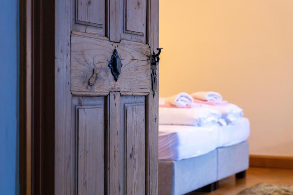 Postel nebo postele na pokoji v ubytování Gästehaus Goldener Stern