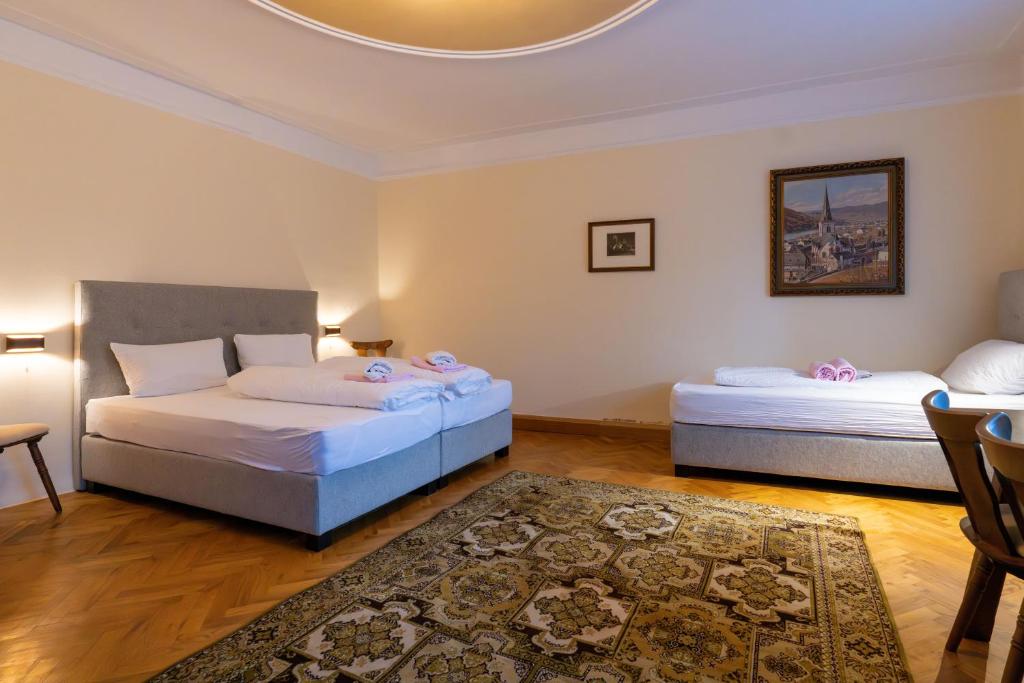 Postel nebo postele na pokoji v ubytování Gästehaus Goldener Stern