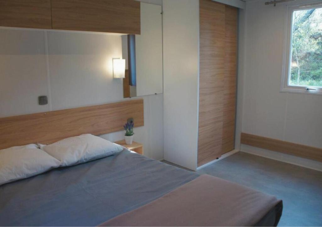 Postel nebo postele na pokoji v ubytování Camping Mulinacciu