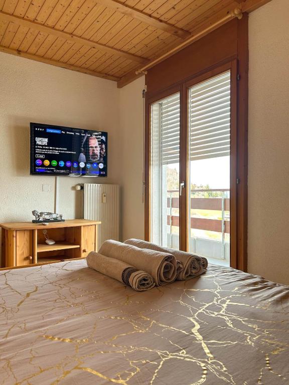 Postel nebo postele na pokoji v ubytování Duplex lumineux avec vue
