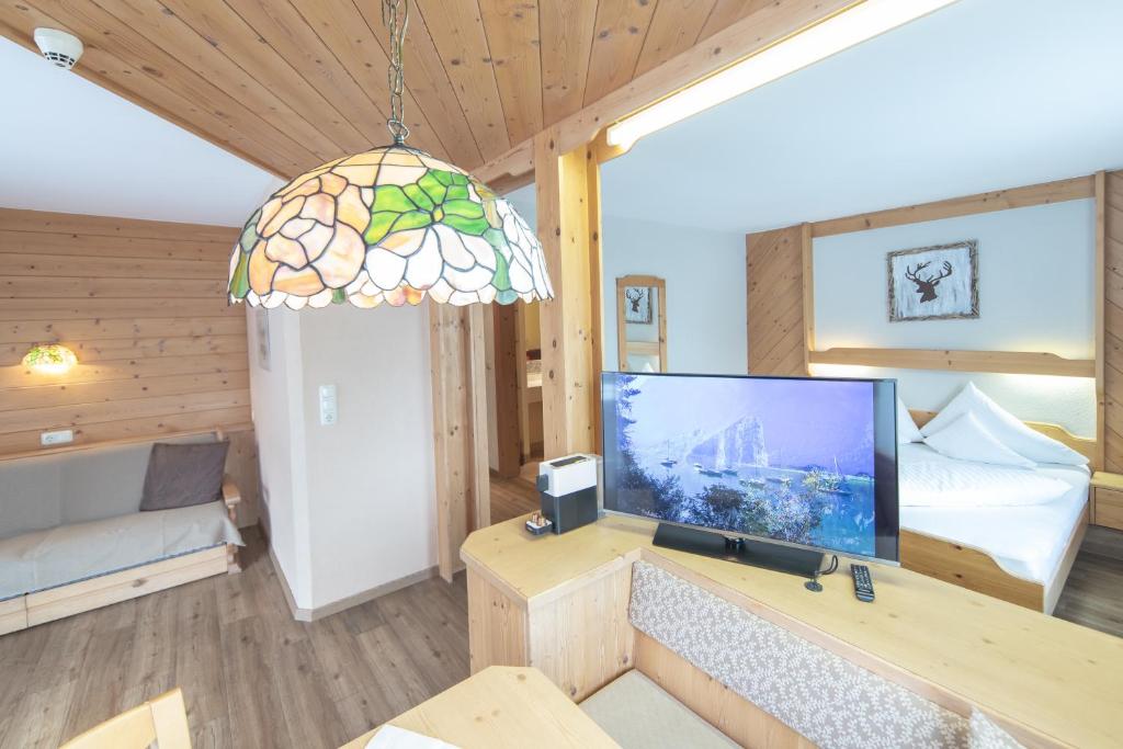 TV a/nebo společenská místnost v ubytování Frühstückshotel Margret