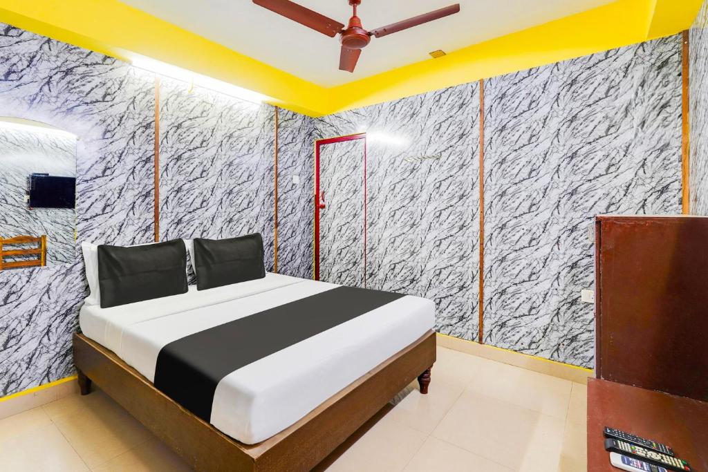 Voodi või voodid majutusasutuse Super Hotel O Heritage Town Formerly Vasavi toas