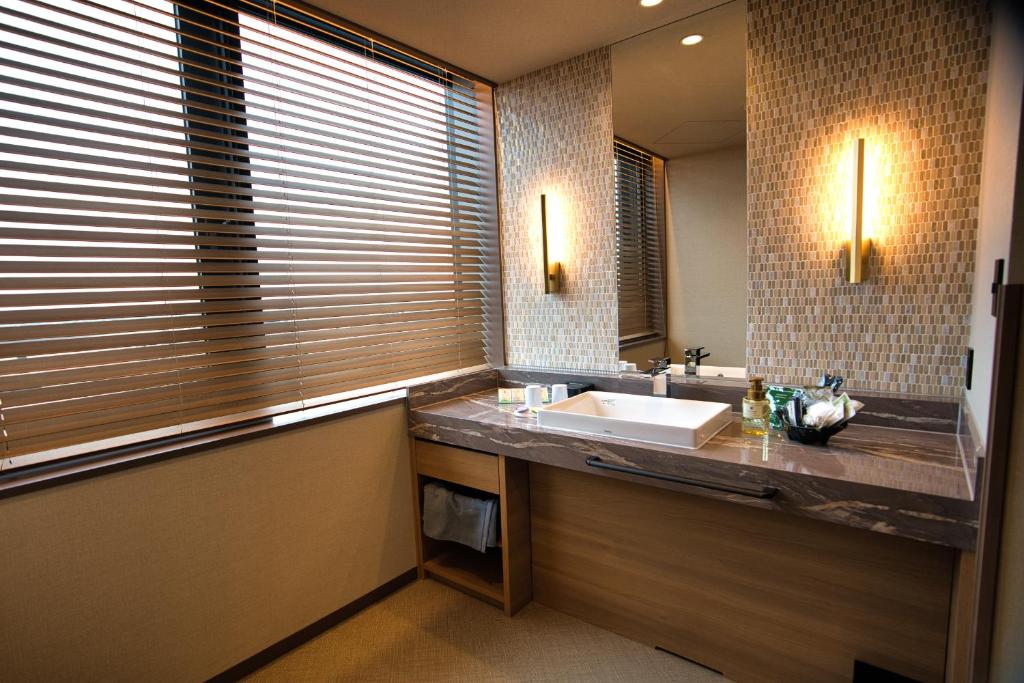 Koupelna v ubytování HOTEL The KAISER-全室人工ラドン温泉ホテル-