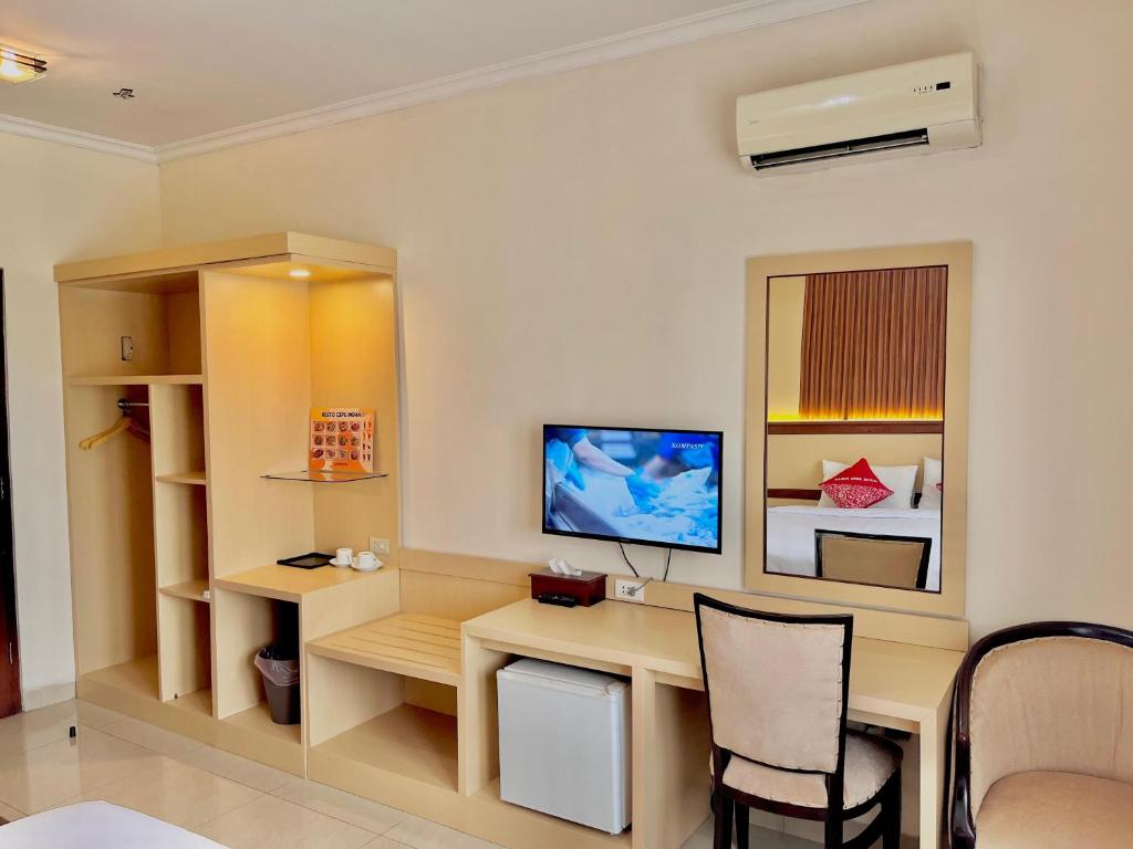 TV a/nebo společenská místnost v ubytování Hotel Cepu Indah 1