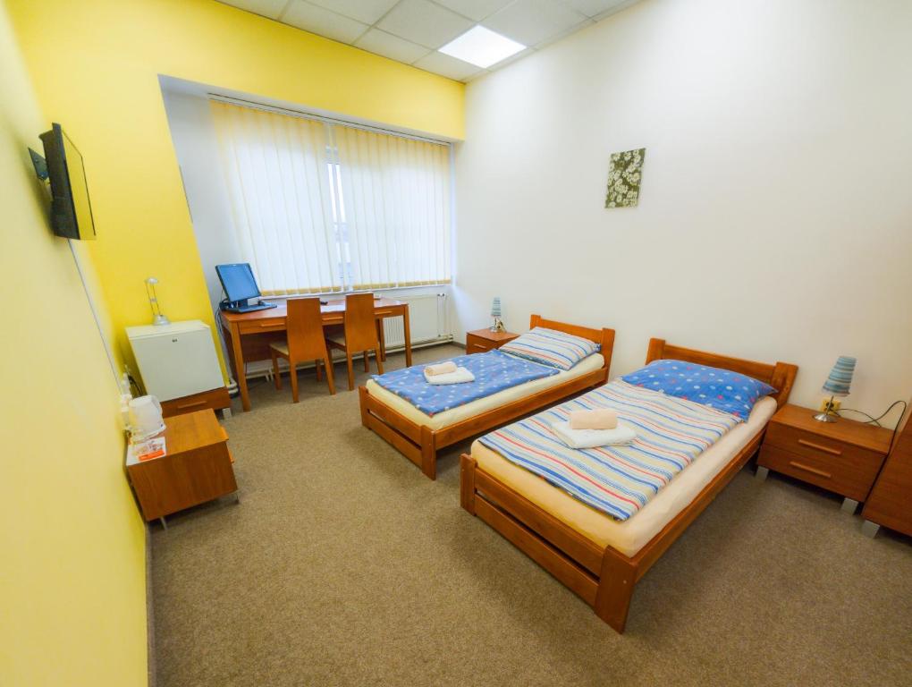 Postel nebo postele na pokoji v ubytování Pension Solnička