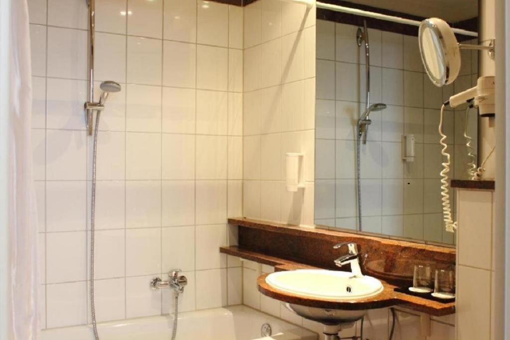 Ein Badezimmer in der Unterkunft Wyndham Garden Berlin Mitte