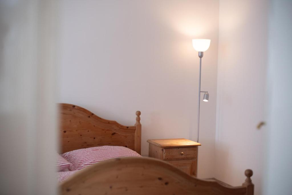 Letto o letti in una camera di VILA GALA ubytování apartmány v secesní vile soukromé PARKOVÁNÍ u domu ZDARMA
