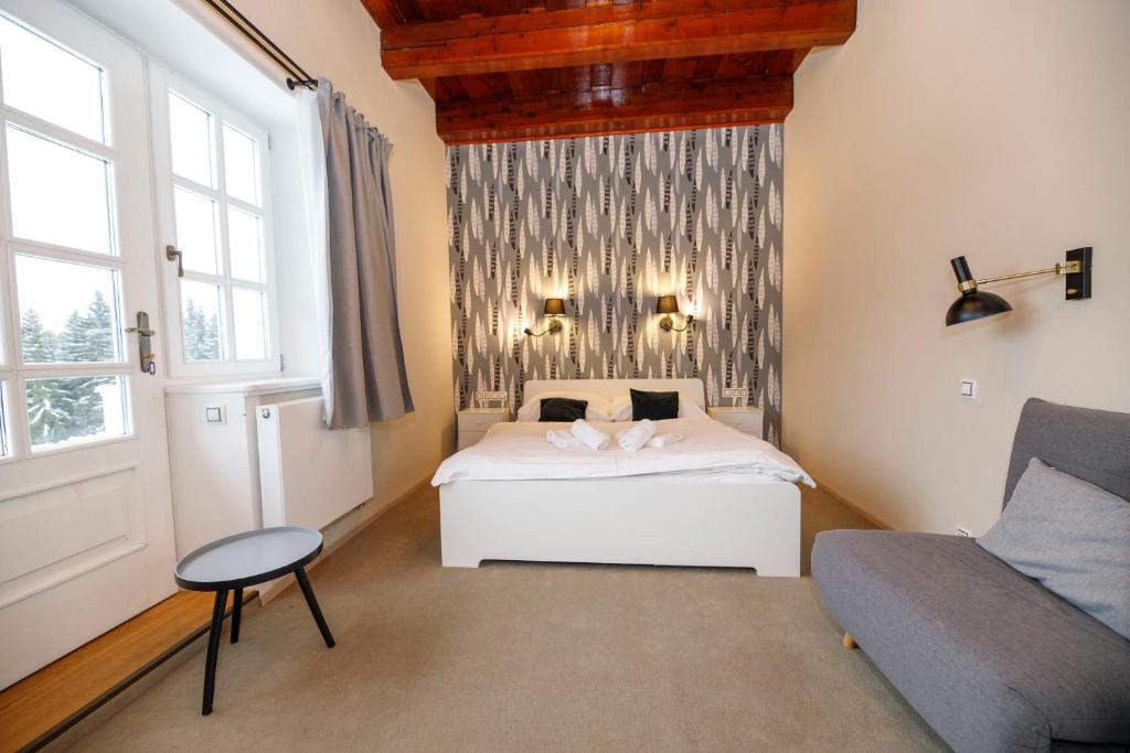 Postel nebo postele na pokoji v ubytování Aparthotel Panorama