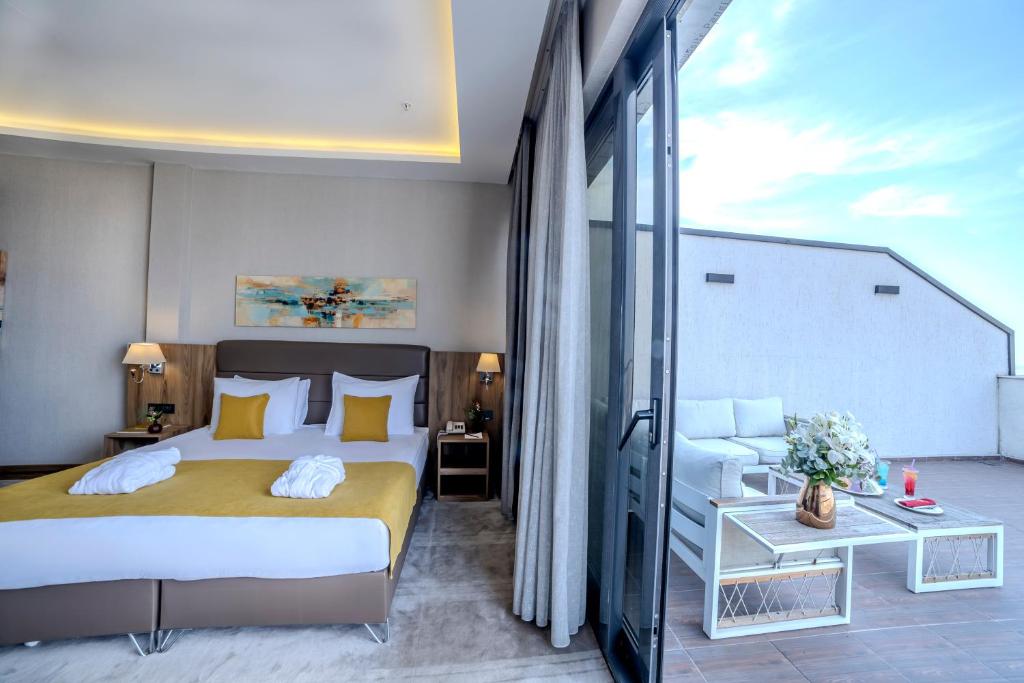 Postel nebo postele na pokoji v ubytování Royal Termal Hotel