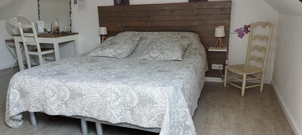 Postel nebo postele na pokoji v ubytování Au Ker Lauriers chambres et table d Hôtes