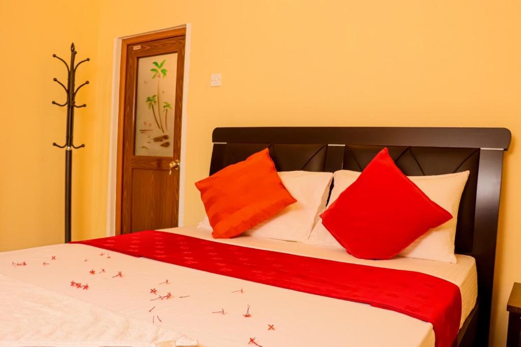 Postel nebo postele na pokoji v ubytování Peacock Resort