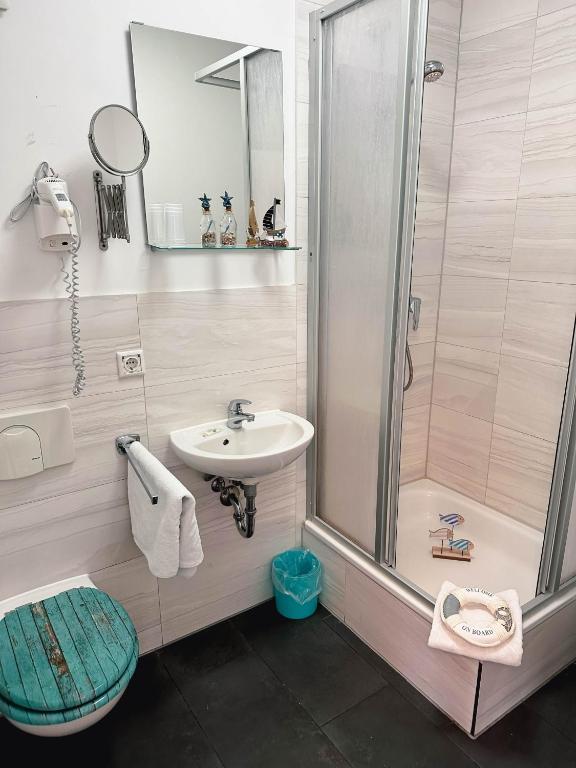 Koupelna v ubytování ORCA Hotel am Elbschloss