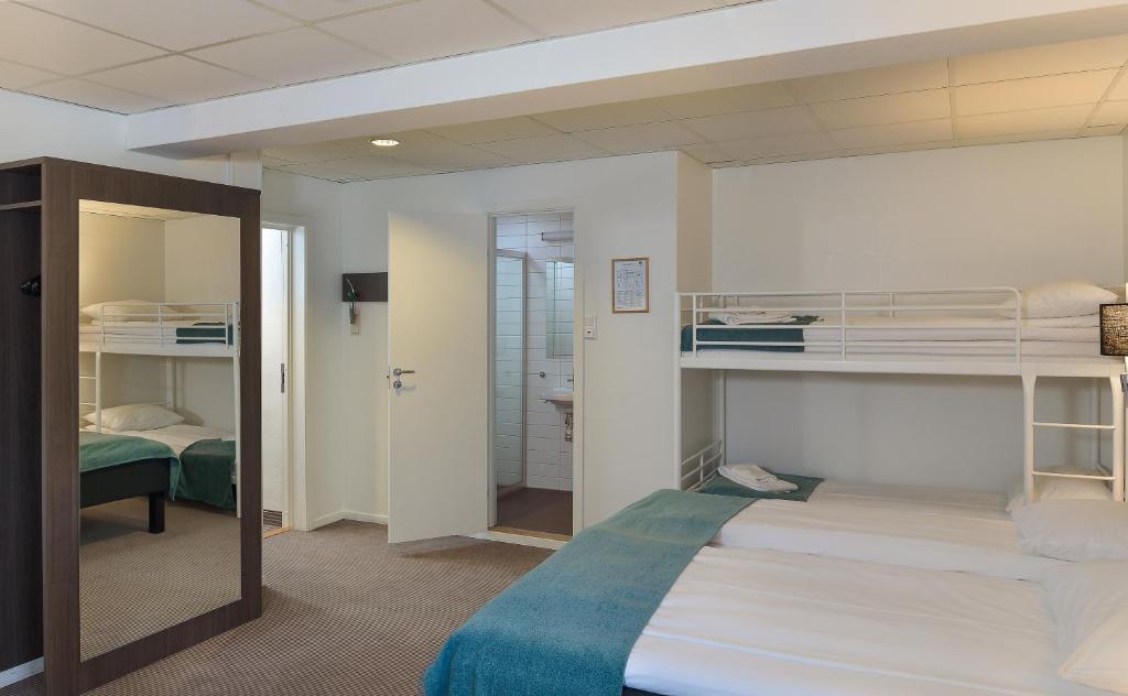 Postel nebo postele na pokoji v ubytování Thon Partner Hotel Andrikken