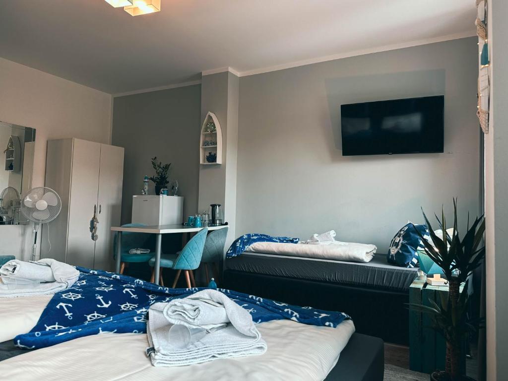 Postel nebo postele na pokoji v ubytování ORCA Hotel am Elbschloss