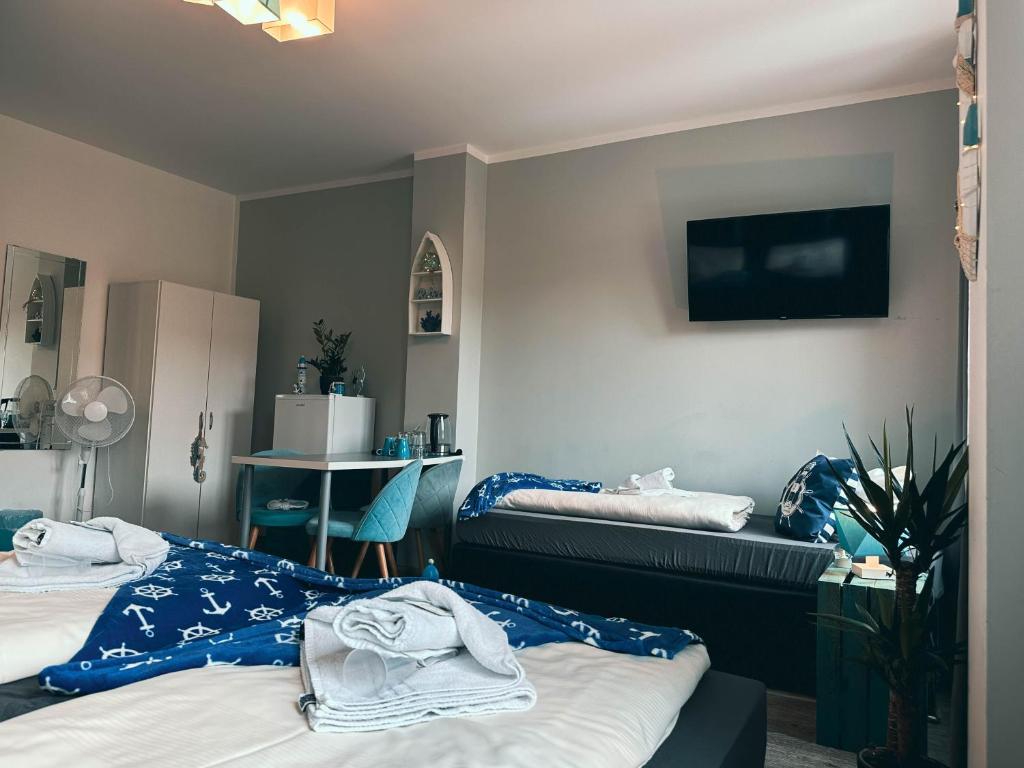 Postel nebo postele na pokoji v ubytování ORCA Hotel am Elbschloss