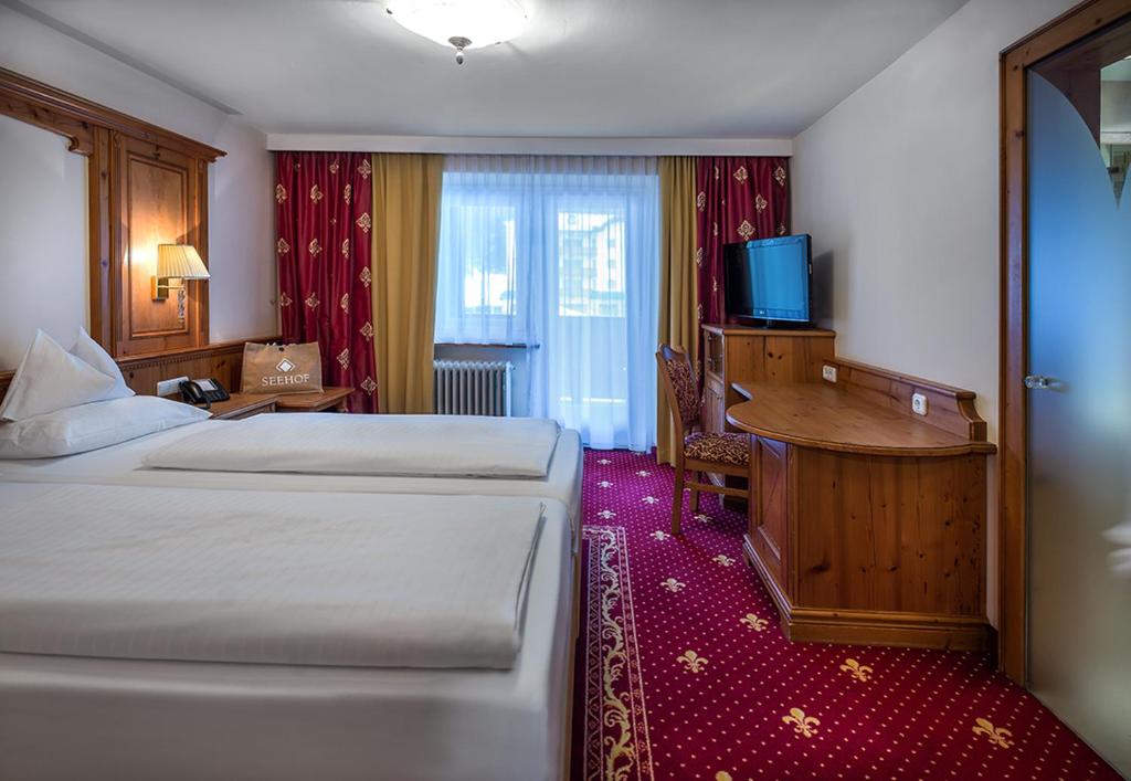 Postel nebo postele na pokoji v ubytování Hotel Seehof