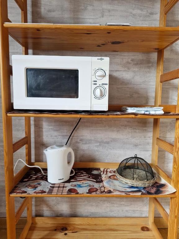 Kuchyň nebo kuchyňský kout v ubytování Deux chambres confortables
