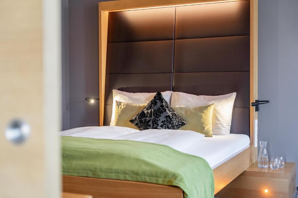Postel nebo postele na pokoji v ubytování Ritzenhof - Hotel und Spa am See 4-Sterne-Superior