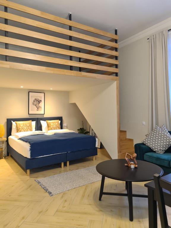 Postel nebo postele na pokoji v ubytování BOHO HOUSE