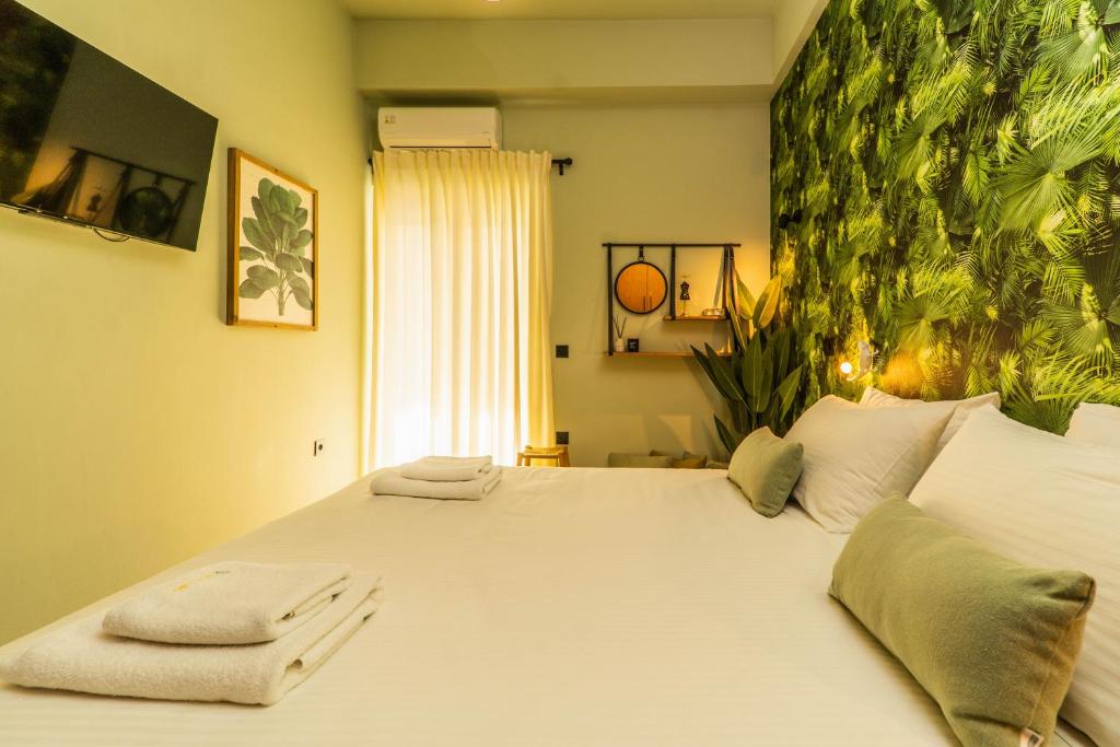 Postel nebo postele na pokoji v ubytování Mimosa Urban Habitation