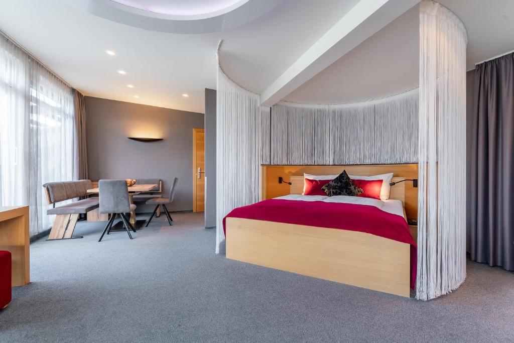 Postel nebo postele na pokoji v ubytování Ritzenhof - Hotel und Spa am See 4-Sterne-Superior