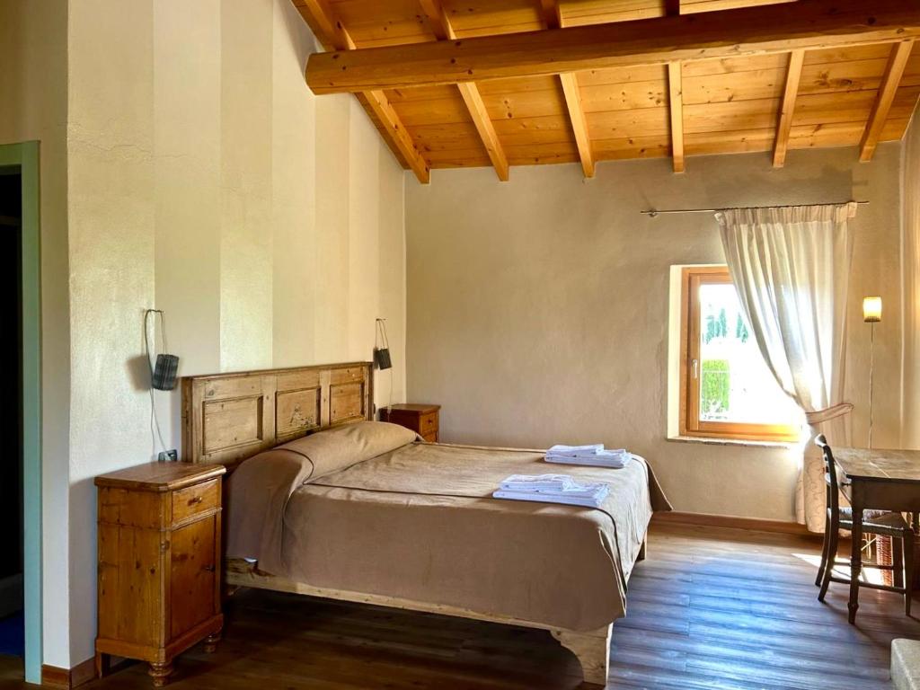Postel nebo postele na pokoji v ubytování Cascina Girolda