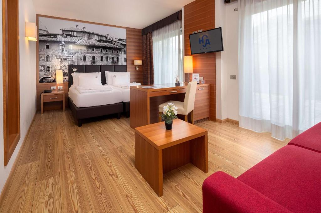 Postel nebo postele na pokoji v ubytování Best Western Hotel Adige