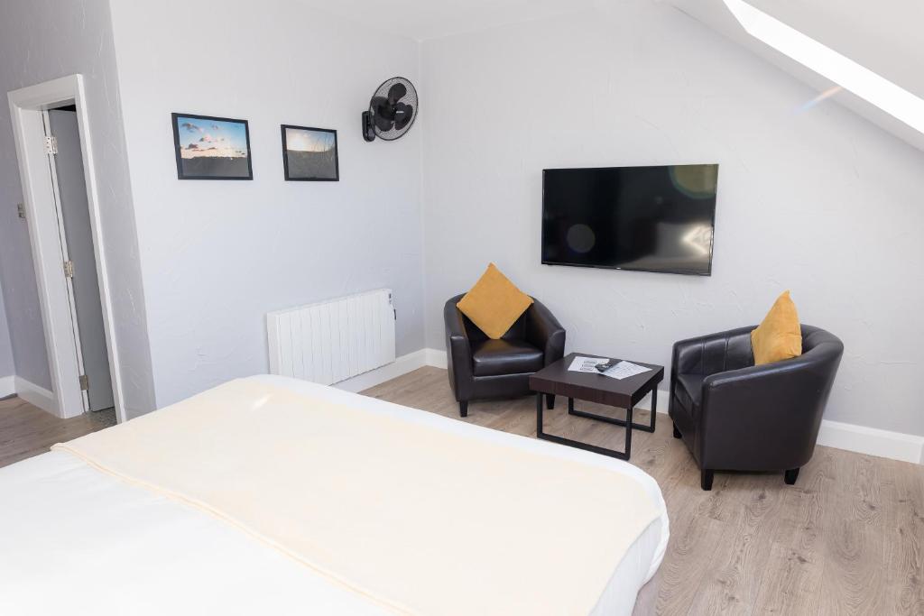 TV a/nebo společenská místnost v ubytování Aran Islands Hotel